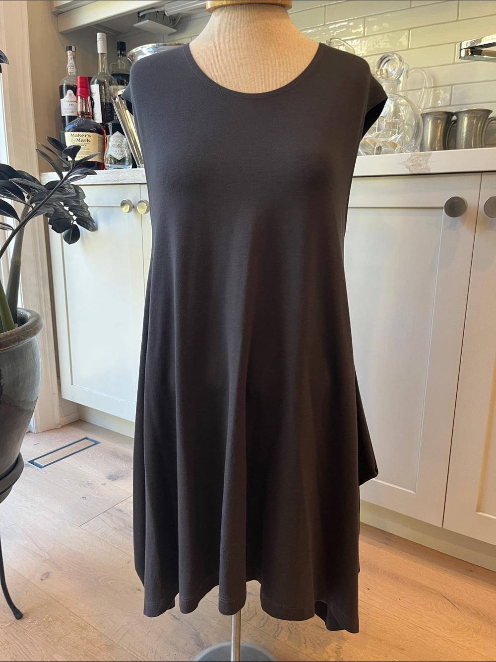 bryn walker Sleeveless A-Line Dress with sharkbite hem in dark grey